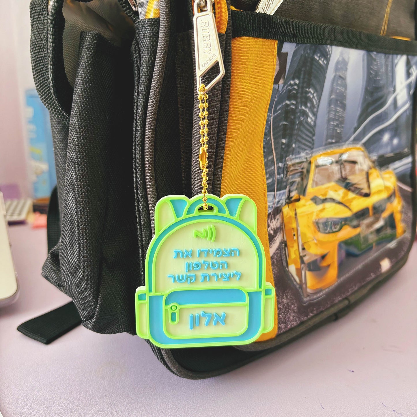 תג NFC אישי לתיק עם שם ופרטי קשר