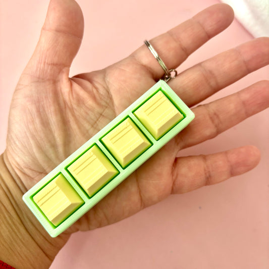 מחזיק מפתחות קליקר בעיצוב מקשי מקלדת